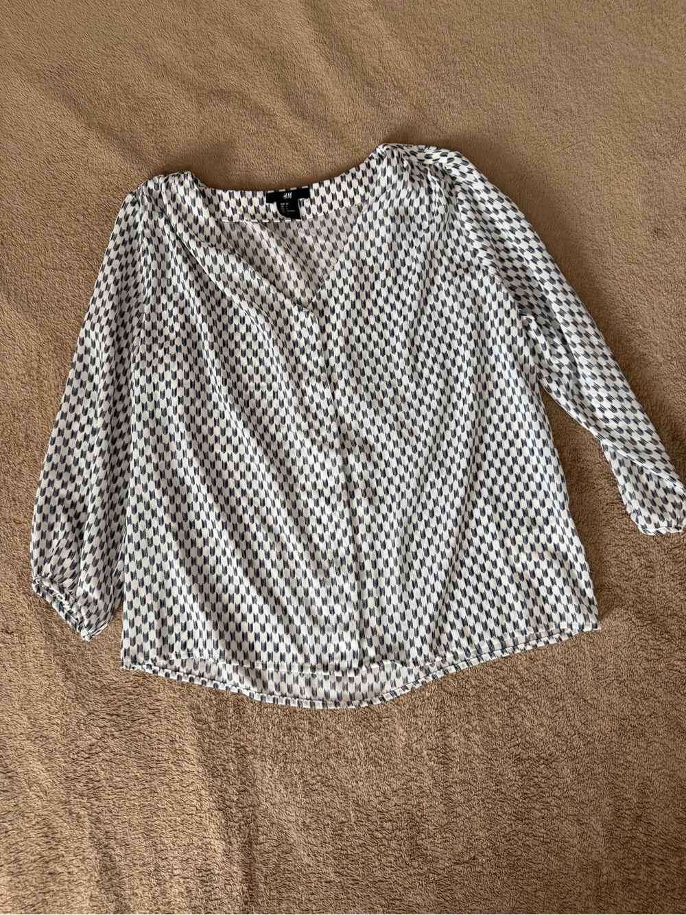 White and Navy Geometric V-Neck Blouse